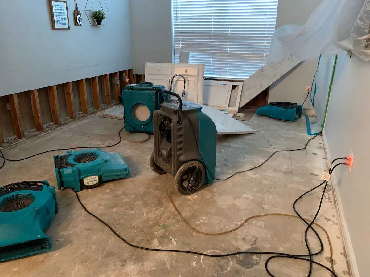 Dehumidifier in flood-cut room for Water Damage Restoration in State College